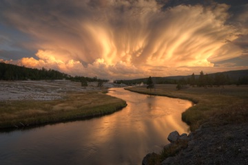 dramatic sunset clouds above the Firehole River, Yellowstone NP, Wyoming, USA