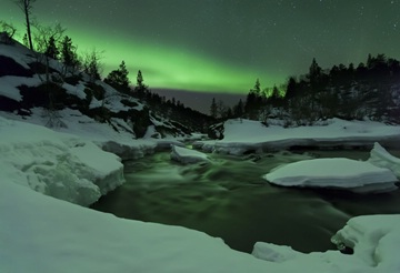 Aurora Borealis over Tennevik River, Troms, Norway (wavy water)