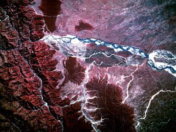 satellite image of a river and mountains