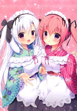 two girls in dresses, one holding cherry petals