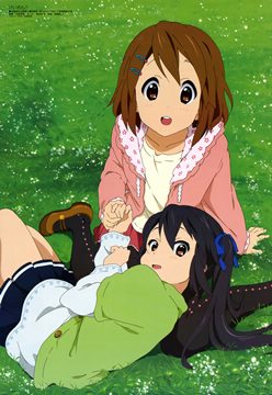 on a meadow, Azusa resting on Yui's lap
