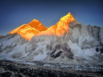 sunset alpenglow over Mount Everest; Nuptse to the right