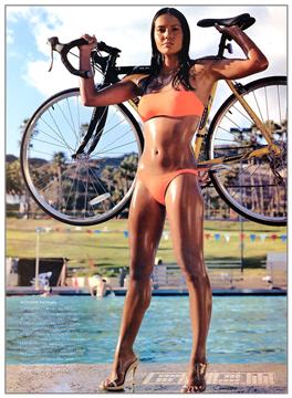 1155134656357 sportswoman with bike