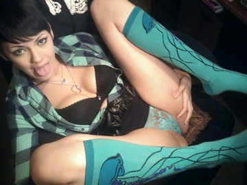 (e) girl in teal socks and panties sticks tongue out