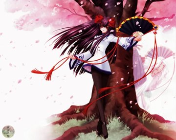 Girl in front of a sakura tree