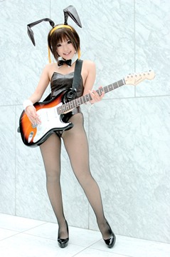 Kipi as Haruhi wearing a bunnysuit, holding an electric guitar