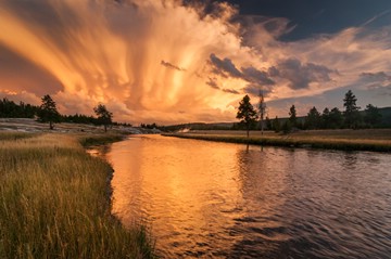 dramatic sunset clouds above the Firehole River, Yellowstone NP, Wyoming, USA (later)