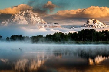 heavy mist over Jackson Lake, Oxbow Bend Island, Grand Teton NP, Wyoming, USA