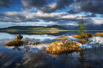 summer Jack London Lake with dramatic clouds, Russia