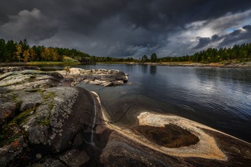 dark clouds over autumn Ladoga Lake, Russia